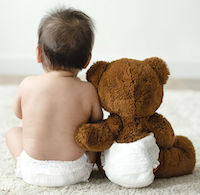 Baby and teddy bear
